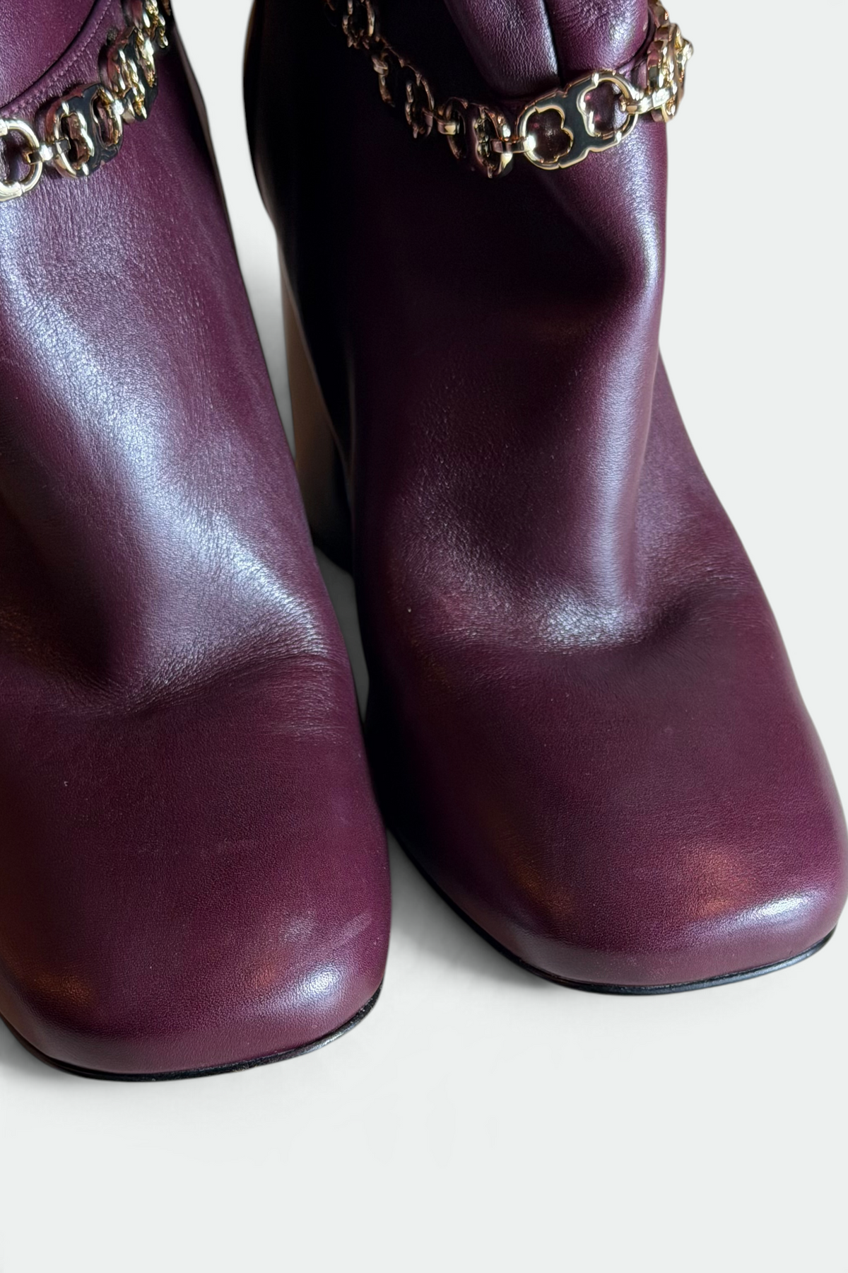 COMING SOON: TORY BURCH PLUM LEATHER FLORAL CHAIN KNEE-HIGH BOOTS | AMERICAN SECONDHAND