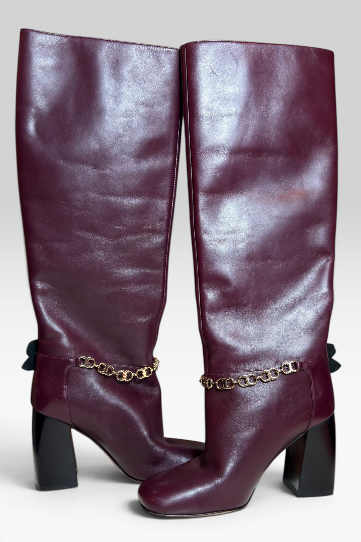 COMING SOON: TORY BURCH PLUM LEATHER FLORAL CHAIN KNEE-HIGH BOOTS | AMERICAN SECONDHAND