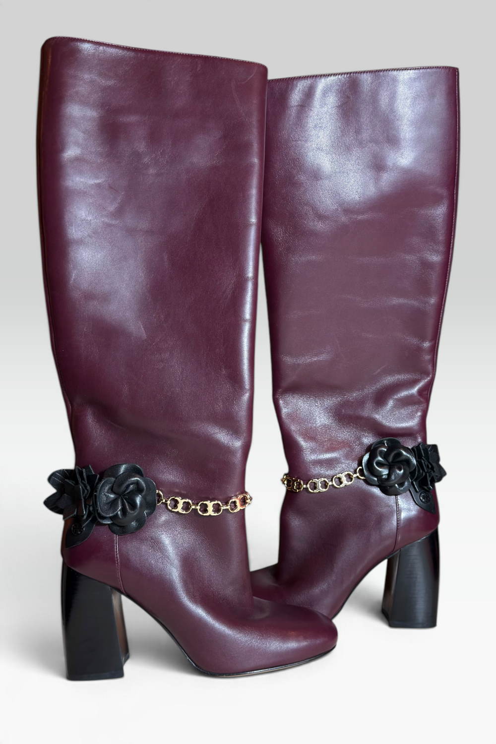 COMING SOON: TORY BURCH PLUM LEATHER FLORAL CHAIN KNEE-HIGH BOOTS | AMERICAN SECONDHAND