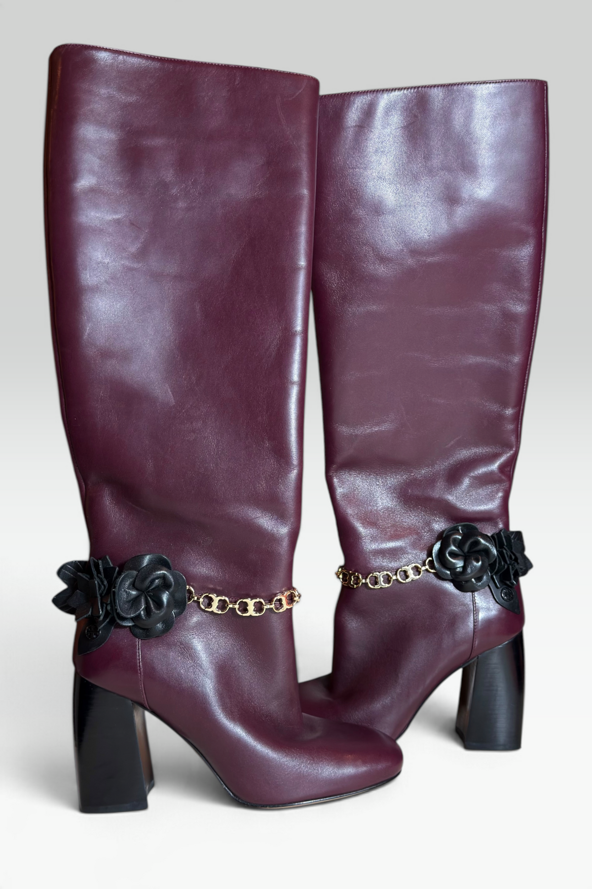 COMING SOON: TORY BURCH PLUM LEATHER FLORAL CHAIN KNEE-HIGH BOOTS | AMERICAN SECONDHAND