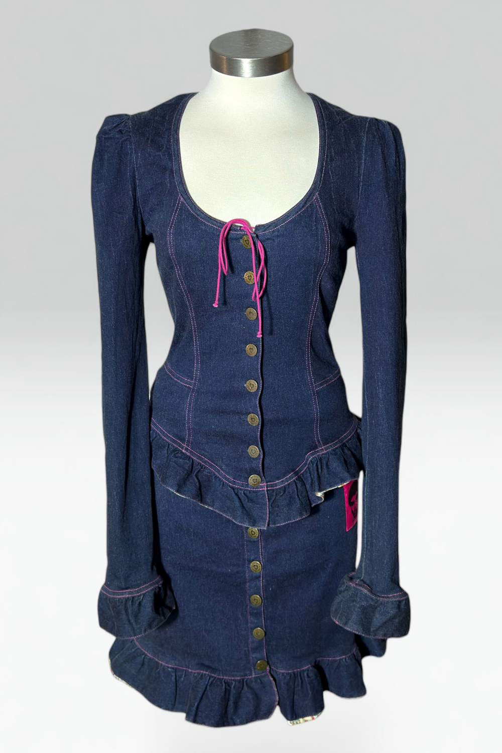 Coming soon: Betsey Johnson Betsey Johnson Pink Stitch Ruffle Dark Denim Skirt Set | American Vintage